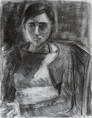 Portrait of a girl sitting in a chair by Deborah Kirklin