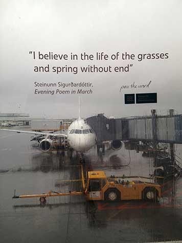 Photograph of airpain on the tarmac with the quote "I Believe in the life of the grasses and spring without end" by Steinunn Sigurdardottir