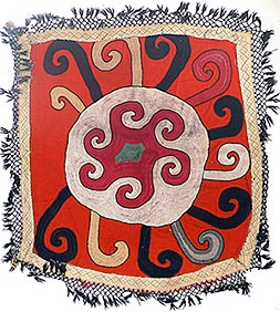 Square cloth with rich embroidery used to cover objects