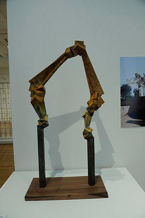 Gallery view of sculpture made from steel and wood 
