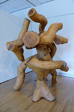 Large sculpture created by intertwining sanded oak branches  