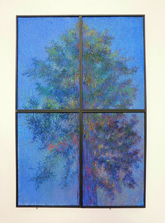  Four panels placed together that create a large tree against a blue background 