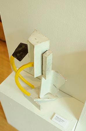 Painted steel white yellow and black organically shaped maquette. 