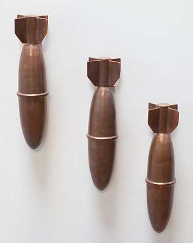 Set of three sculpted bombs by Evan Chambers