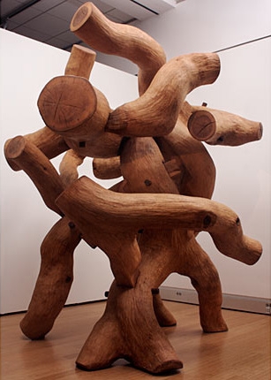 Large sculpture created by intertwining sanded oak branches  