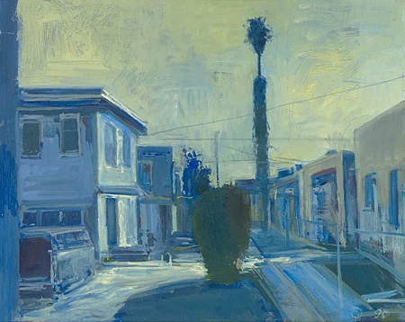 City scene of a street with stucco houses.   